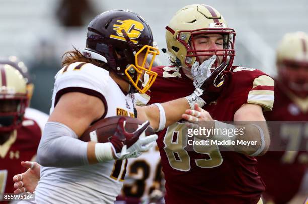 Tommy Sweeney of the Boston College Eagles attempts to tackle Alex Briones of the Central Michigan Chippewas during the second half at Alumni Stadium...
