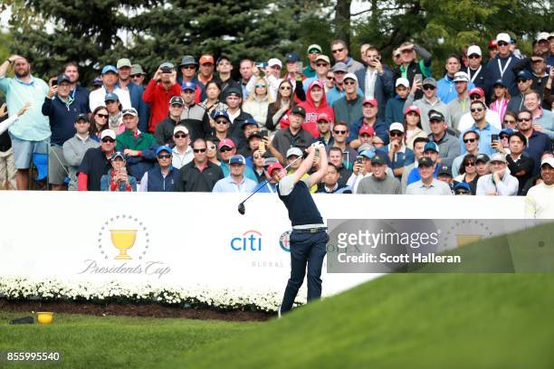 Daniel Berger of the U.S. Team plays his shot from the fourth tee during the afternoon four-ball matches at the Presidents Cup at Liberty National...