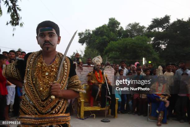 Indian artists,dressed as Demon characters,perform during traditional Ramleela,a play narrating the life of Hindu God Ram,on ocassion of Dussehra...