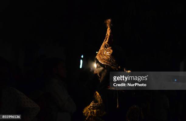 An indian artist,dressed as Demon character,performs during traditional Ramleela,a play narrating the life of Hindu God Ram,on ocassion of Dussehra...