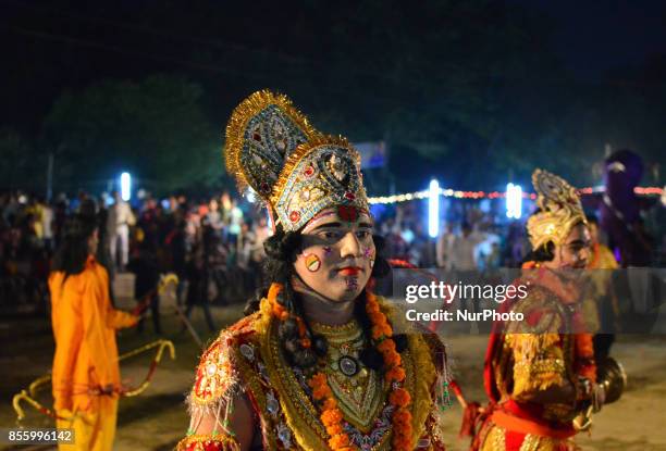 Indian artists,dressed as various characters,perform during traditional Ramleela,a play narrating the life of Hindu God Ram,on ocassion of Dussehra...