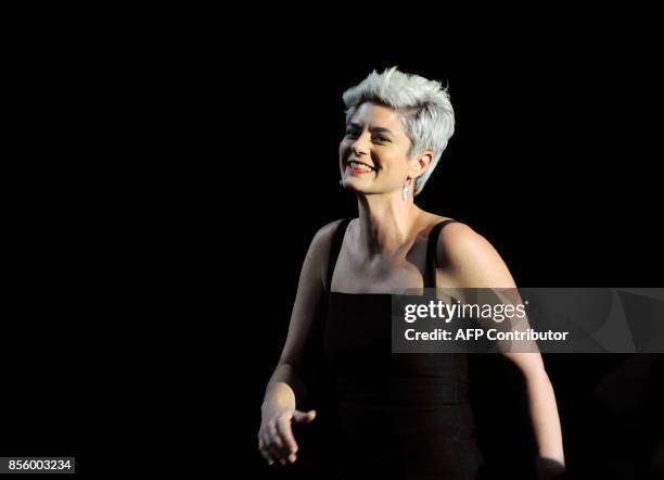 Argentinian director Anahi Berneri smiles before receiving the "Concha de Plata" best director award for her film "Alanis" during the 65th San...