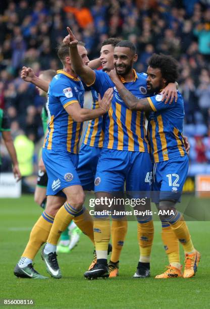 Stefan Payne of Shrewsbury Town celebrates with his team mates after scoring a goal to make it 1-0 during the Sky Bet League One match between...