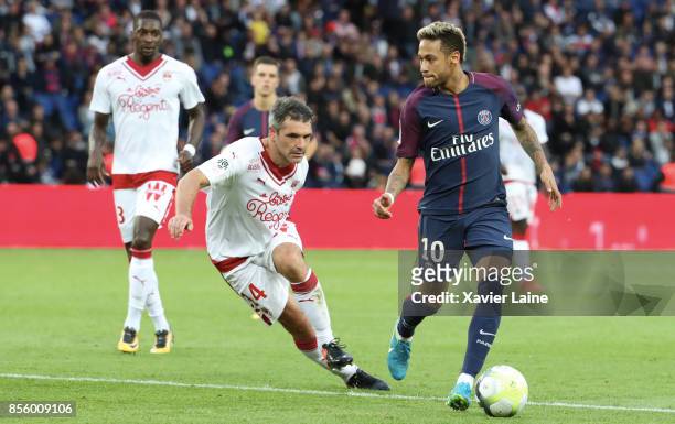 Neymar Jr of Paris Saint-Germain in action with Jeremy Toulalan of FC Girondins de Bordeaux during the Ligue 1 match between Paris Saint-Germain and...