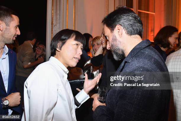 Angelica Cheung and Jose Neves attend the Buro 24/7 X Farfetch Fashion Forward Initiative as part of the Paris Fashion Week Womenswear Spring/Summer...