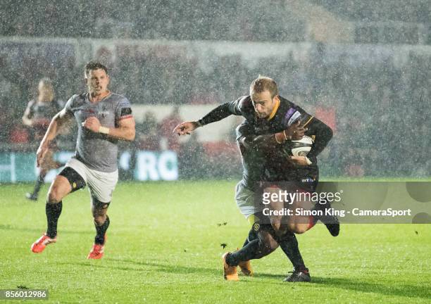 Dragons' Sarel Pretorius is tackled by Southern Kings' Masixole Banda during the Guinness Pro14 Round 5 match between Dragons and Southern Kings at...