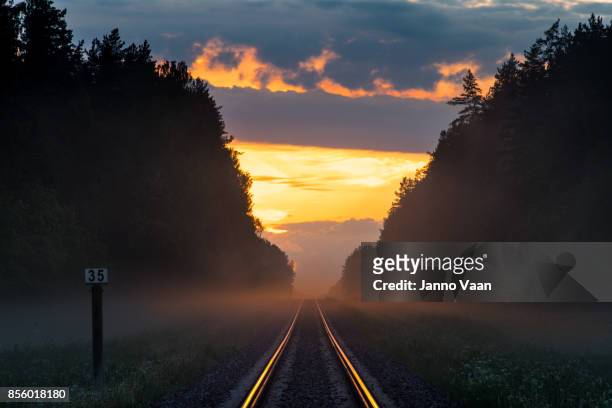 railroad sunset - railway tracks sunset stock pictures, royalty-free photos & images
