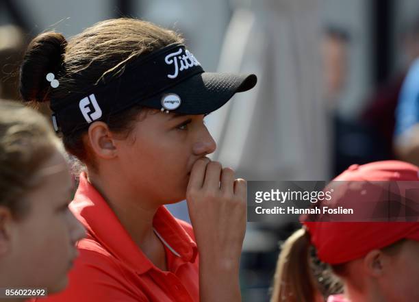 Alexa Pano reacts as the scores come in for the girls 12-13 category at the regional round of the Drive, Chip and Putt Championship on September 30,...