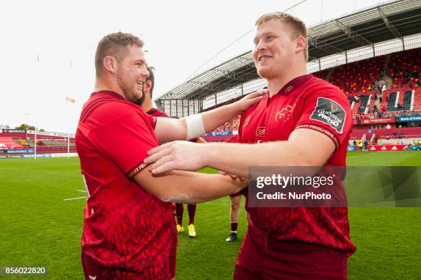 Liam O'Connor and John Ryan of Munster celebrate during the Guinness PRO14 Conference A Round 5 match between Munster Rugby and Cardiff Blues at...