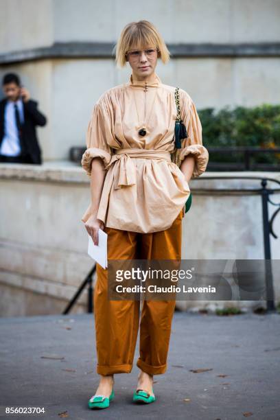 Vika Gazinskaya is seen before the Mugler show during Paris Fashion Week Womenswear SS18 on September 30, 2017 in Paris, France.