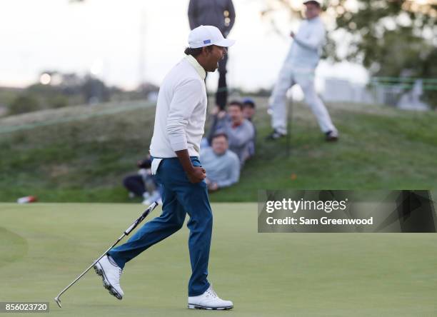 Anirban Lahiri of India and the International Team celebrates on the 17th green during Saturday four-ball matches of the Presidents Cup at Liberty...