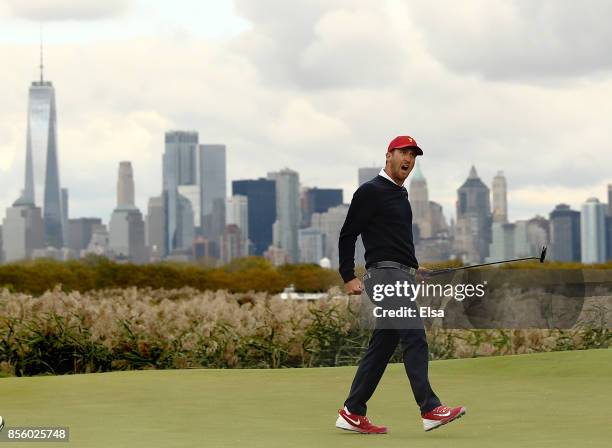Kevin Chappell of the U.S. Team celebrates on the 10th green during Saturday four-ball matches of the Presidents Cup at Liberty National Golf Club on...
