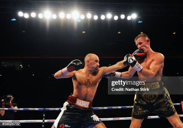 Sean Dodd lands a shot on Tom Stalker during the Battle on the Mersey Commonwealth Lightweight Championship fight at Echo Arena on September 30, 2017...