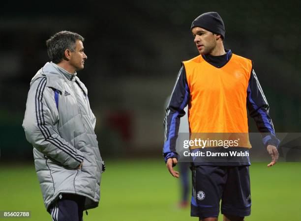 Chelsea manager Jose Mourinho chats with Michael Ballack