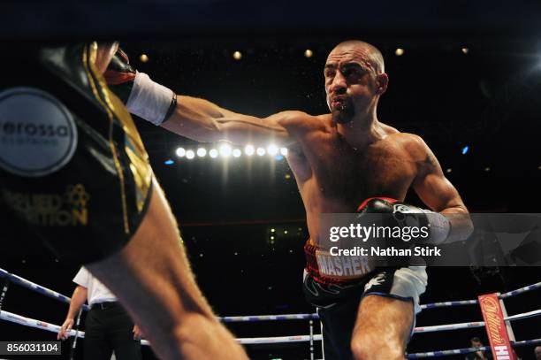 Sean Dodd lands a shot on Tom Stalker during the Battle on the Mersey Commonwealth Lightweight Championship fight at Echo Arena on September 30, 2017...