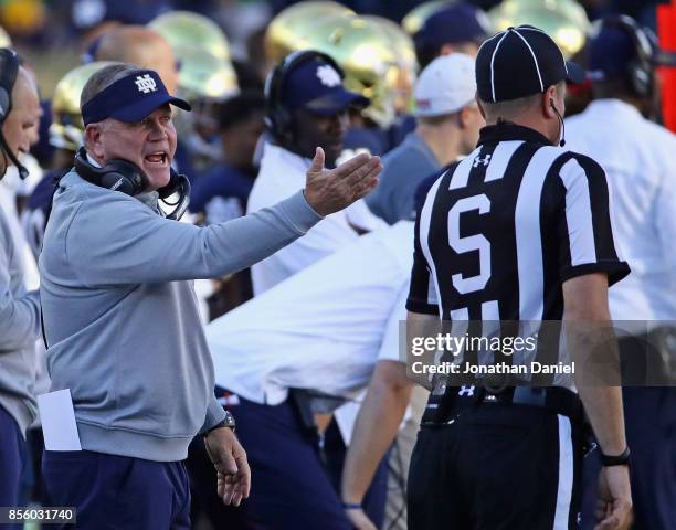 Head coach Brian Kelly of the Notre Dame Fighting Irish yells at a referee during a game against the Miami Redhawks at Notre Dame Stadium on...