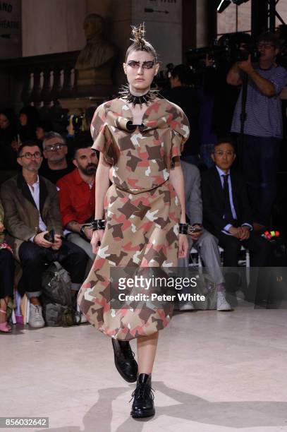 Model walks the runway during the Junya Watanabe show as part of the Paris Fashion Week Womenswear Spring/Summer 2018 on September 30, 2017 in Paris,...