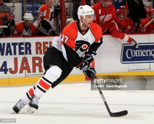 Jeff Carter of the Philadelphia Flyers skates with the puck during a NHL game against the Detroit Red Wings on March 17, 2009 at Joe Louis Arena in...