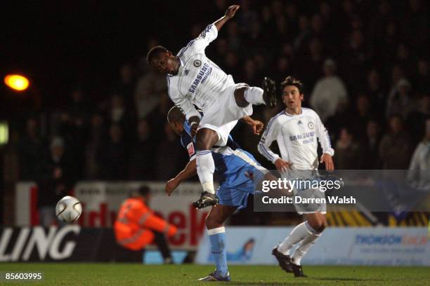 Chelsea's Michael Essien battle with Wycombe Wanderers' Jermaine Easter