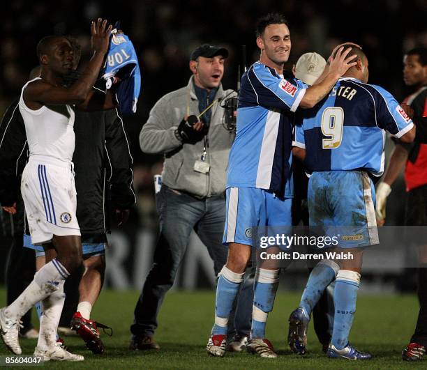 Chelsea's Geremi and Wycombe Wanderer's Jermaine Easter Mike Williamson celebrate after the final whistle