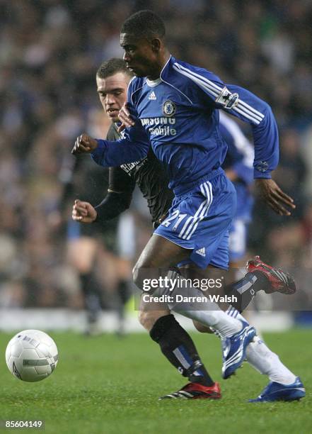 Chelsea's Salomon Kalou is challenged by Macclesfield Town's Jordan Hadfield