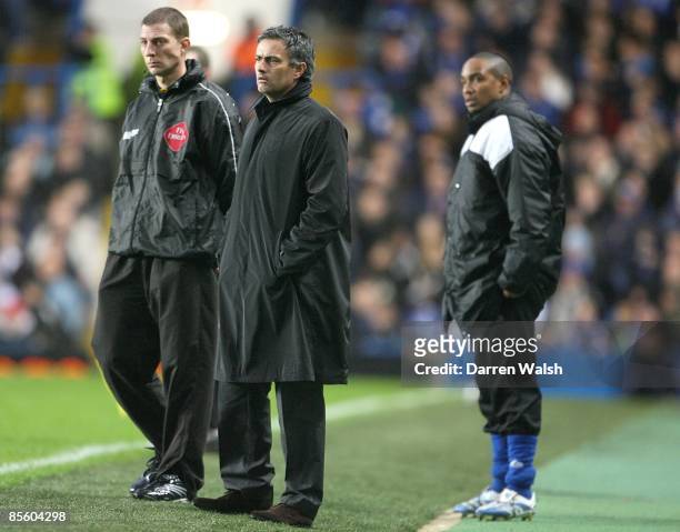 Chelsea's manager Jose Mourinho and Macclesfield Town's manager Paul Ince stand on the touchline