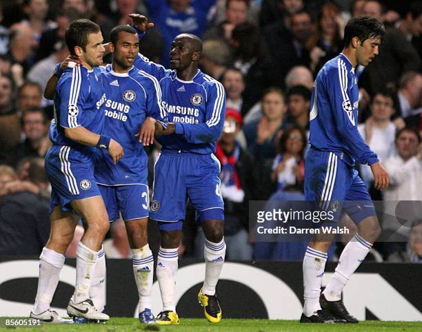 Chelsea goalscorer Joe Cole celebrates with team mates