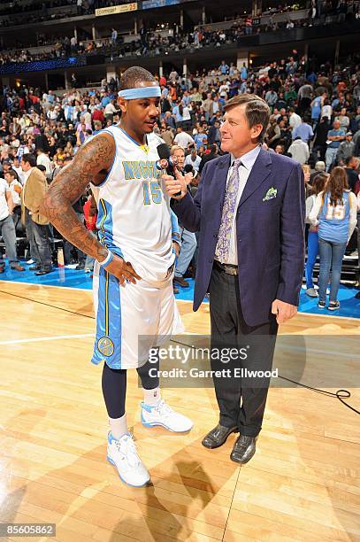 Craig Sager of TNT interviews Carmelo Anthony of the Denver Nuggets during the game against the Portland Trail Blazers on March 5, 2009 at the Pepsi...