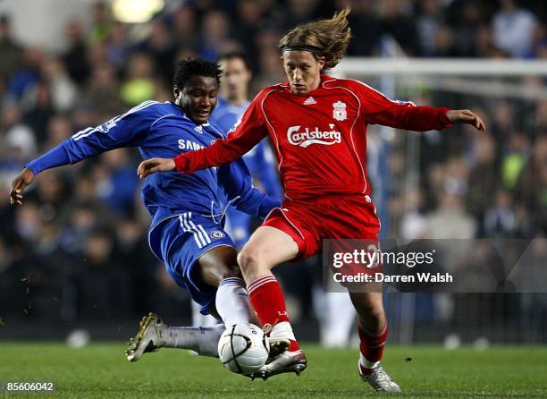 Chelsea's Mikel John Obi slides into tackle Liverpool's Leiva Lucas