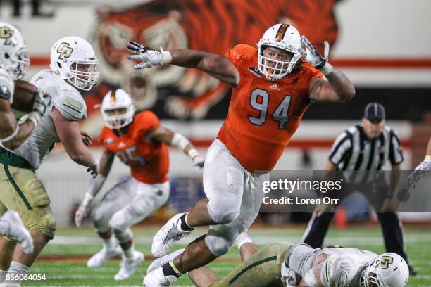 Defensive lineman JonRhyeem Peoples of the Idaho State Bengals zeros in on the ball carrier during second half action against the Cal Poly Mustangs...