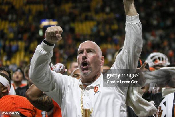 Head coach Rob Phenicie of the Idaho State Bengals celebrates at the end of the game against the Cal Poly Mustangs on September 30, 2017 at Holt...