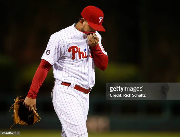 Pitcher Henderson Alvarez of the Philadelphia Phillies walks off the mound after being relieved in the fifth inning against the New York Mets during...