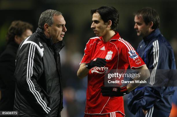 Liverpool's Yossi Benayoun chats to fellow countryman Avram Grant, Chelsea manager