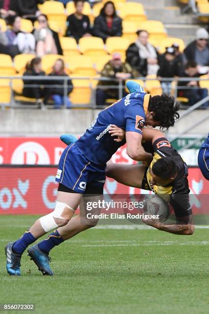 Jonathan Ruru of Otago tackles Kemara Hauiti-Parapara of Wellington during the round seven Mitre 10 Cup match between Wellington and Otago on October...