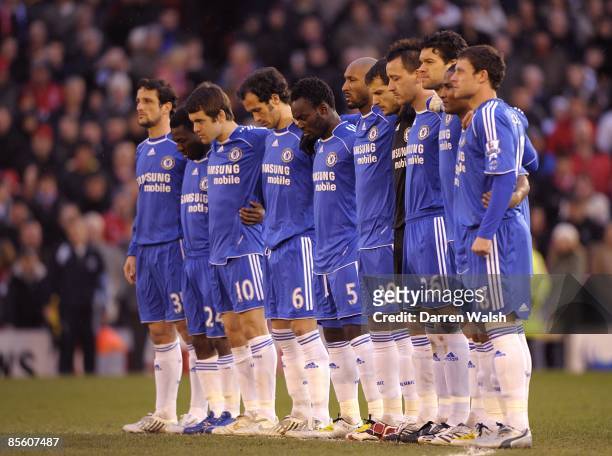 Chelsea players observe a minutes silence in memory of former Sheffield Wednesday player and manager Derek Dooley