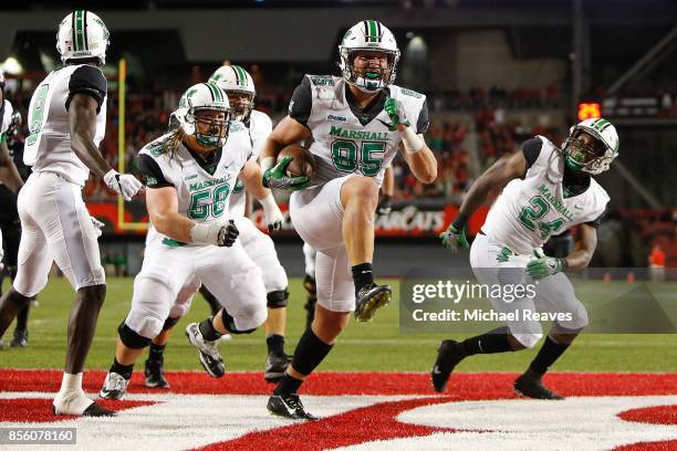Ryan Yurachek of the Marshall Thundering Herd celebrates after scoring a touchdown against the Cincinnati Bearcats during the first half at Nippert...