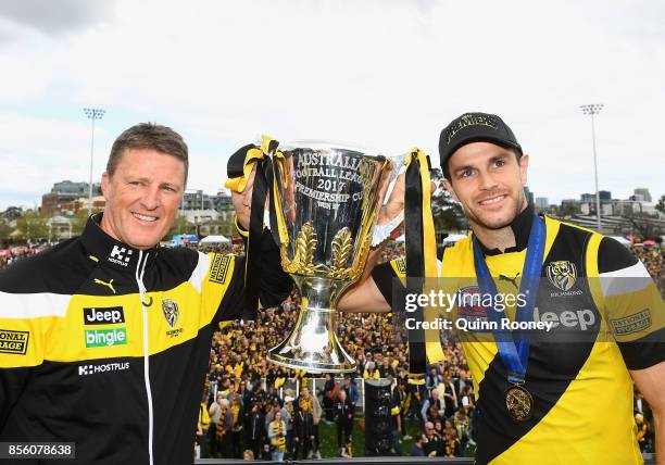 Damien Hardwick and Trent Cotchin of the Tigers hold up the Premiership Trophy after winning yesterday's AFL Grand Final, at Punt Road Oval on...