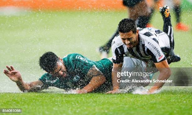 Thiago Santos of Palmeiras and Jean Mota of Santos in action during the match between Palmeiras and Santos for the Brasileirao Series A 2017 at...