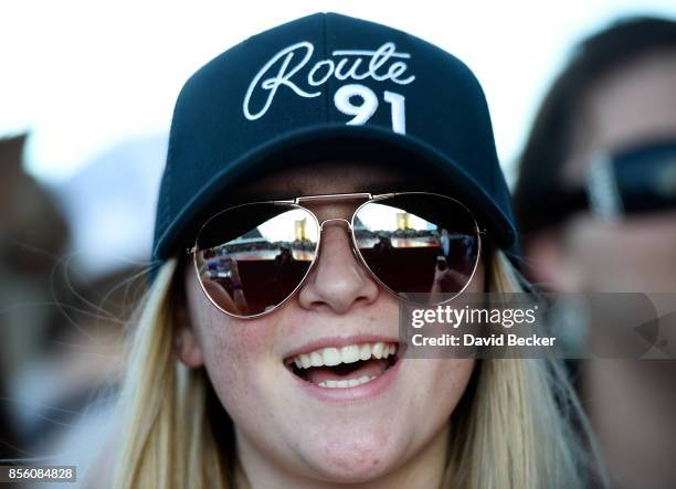 Fans cheers during the Route 91 Harvest country music festival at the Las Vegas Village on September 30, 2017 in Las Vegas, Nevada.