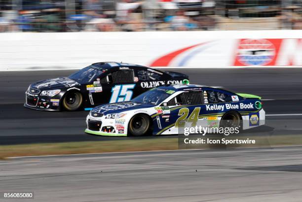 Chase Elliott, Monster Energy NASCAR Cup Series driver of the Kelley Blue Book Chevrolet , passes Reed Sorenson, Monster Energy NASCAR Cup Series...