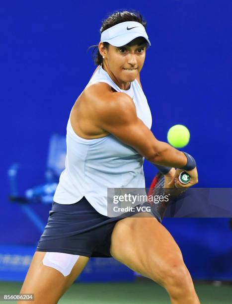 Caroline Garcia of France returns a shot during the ladies singles final against Ashleigh Barty of Australia on Day 7 of 2017 Dongfeng Motor Wuhan...