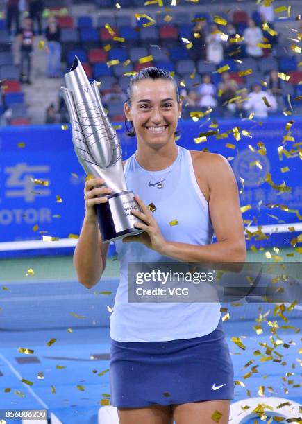 Caroline Garcia of France poses with her trophy after winning the ladies singles final against Ashleigh Barty of Australia on Day 7 of 2017 Dongfeng...