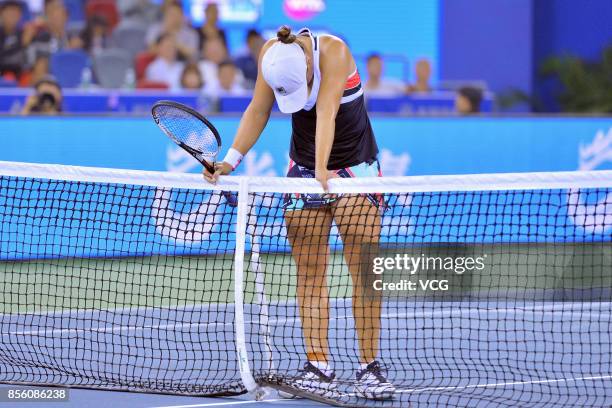 Ashleigh Barty of Australia reacts after the ladies singles final against Caroline Garcia of France on Day 7 of 2017 Dongfeng Motor Wuhan Open at...