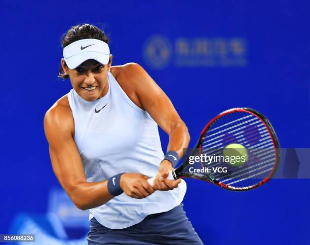 Caroline Garcia of France returns a shot during the ladies singles final against Ashleigh Barty of Australia on Day 7 of 2017 Dongfeng Motor Wuhan...