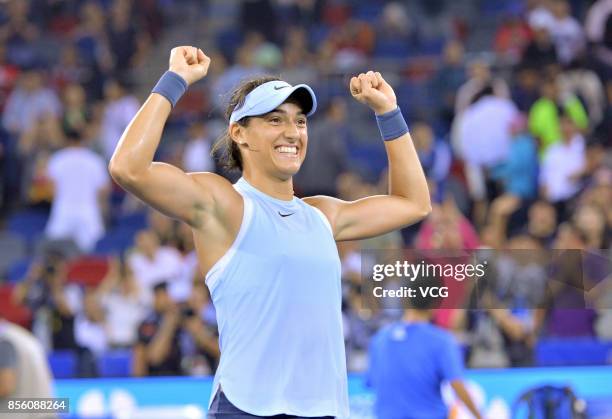 Caroline Garcia of France cerebrates after winning the ladies singles final against Ashleigh Barty of Australia on Day 7 of 2017 Dongfeng Motor Wuhan...