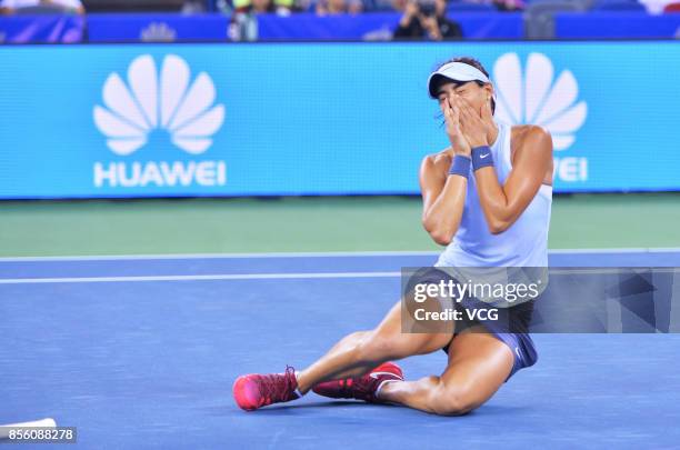 Caroline Garcia of France cerebrates after winning the ladies singles final against Ashleigh Barty of Australia on Day 7 of 2017 Dongfeng Motor Wuhan...