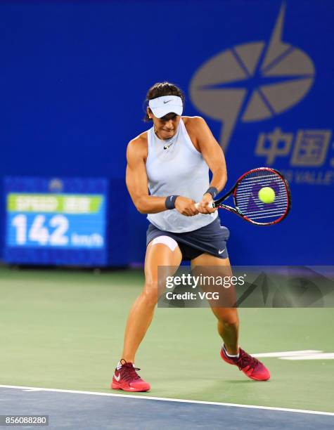 Caroline Garcia of France returns a shot during the ladies singles final against Ashleigh Barty of Australia on Day 7 of 2017 Dongfeng Motor Wuhan...