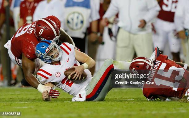 Ronnie Harrison of the Alabama Crimson Tide sacks Shea Patterson of the Mississippi Rebels at Bryant-Denny Stadium on September 30, 2017 in...