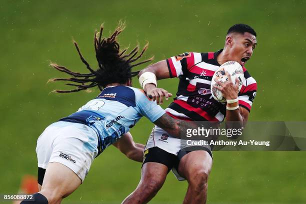 Nigel Ah Wong of Counties Manukau is tackled by Rene Ranger of Northland during the round seven Mitre 10 Cup match between Counties Manukau and...
