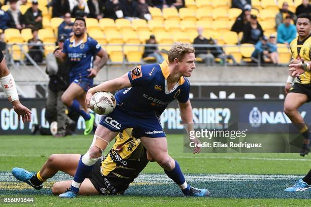 Josh Renton of Otago looks to offload ball during the round seven Mitre 10 Cup match between Wellington and Otago on October 1, 2017 in Wellington,...